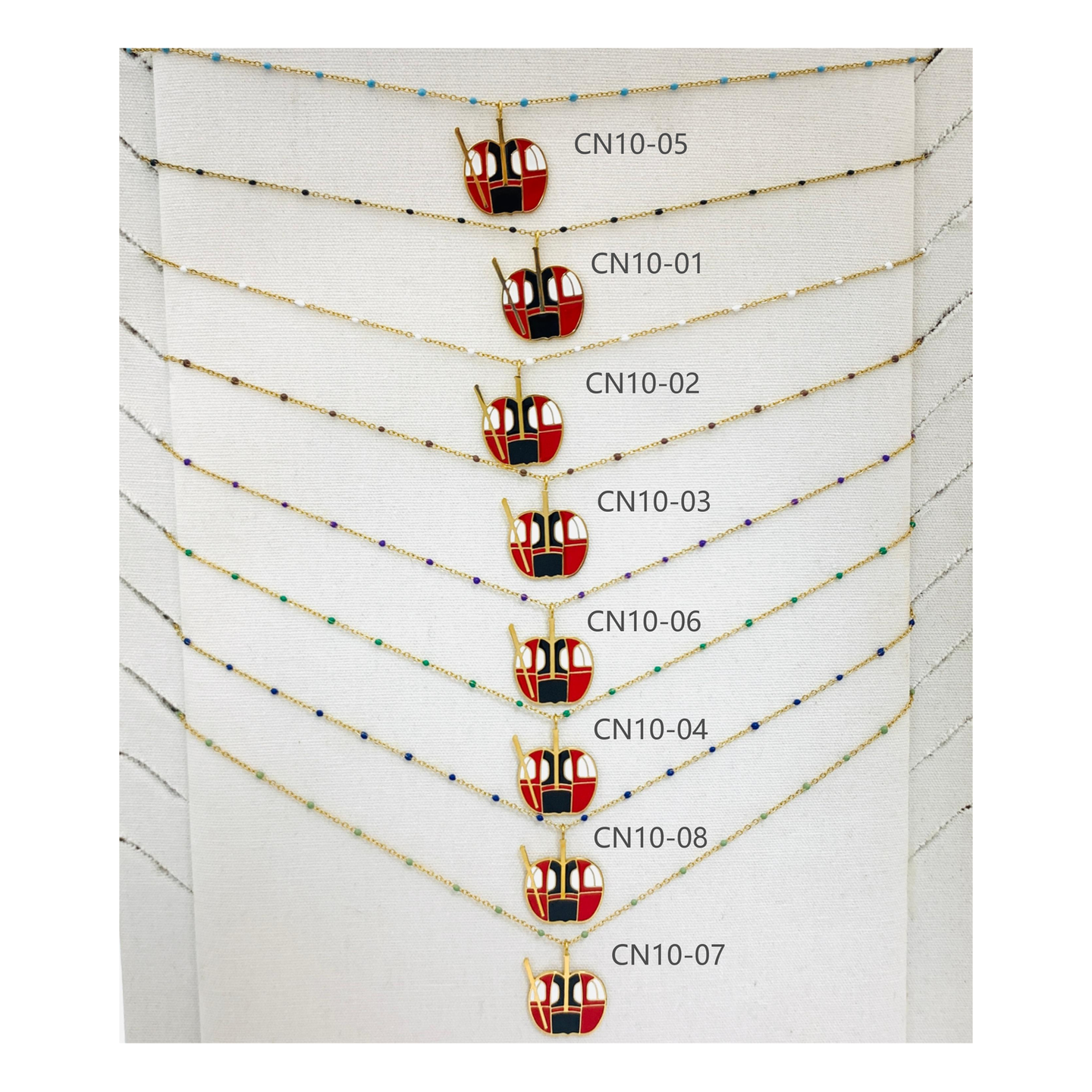 COLLIER CN10 TÉLÉCABINE OR (16 MODELES) - 01 COU EN BOIS N25